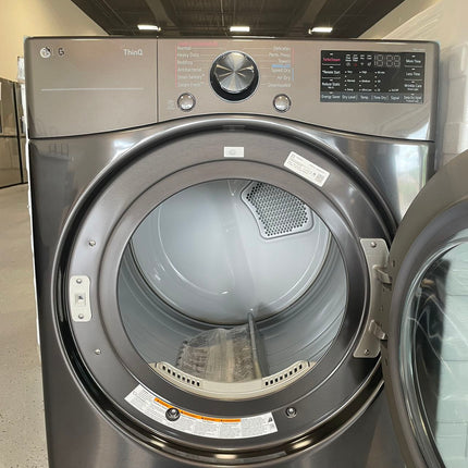 LG 4.5 cu. ft. Front Load Washer with TurboWash 360 and 7.4 cu. ft. GAS Dryer with TurboSteam and Built-In Intelligence