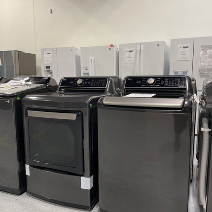 LG 5.5 cu. ft. Mega Capacity Top Load Washer with TurboWash3D Technology and 7.3 cu. ft. Ultra Large Capacity GAS Dryer with EasyLoad Door