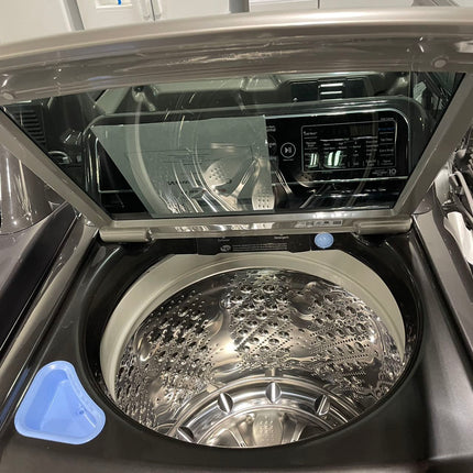 LG 5.5 cu. ft. Mega Capacity Top Load Washer with TurboWash3D Technology and 7.3 cu. ft. Ultra Large Capacity GAS Dryer with EasyLoad Door