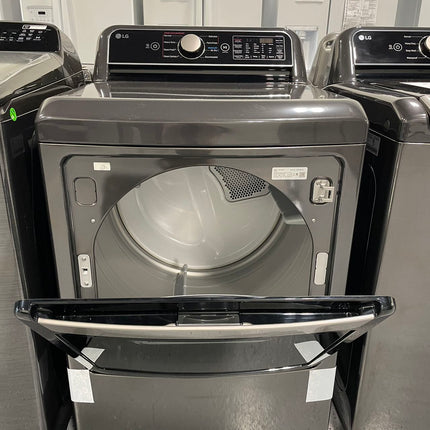 LG 5.5 cu. ft. Mega Capacity Top Load Washer with TurboWash3D Technology and 7.3 cu. ft. Ultra Large Capacity GAS Dryer with EasyLoad Door